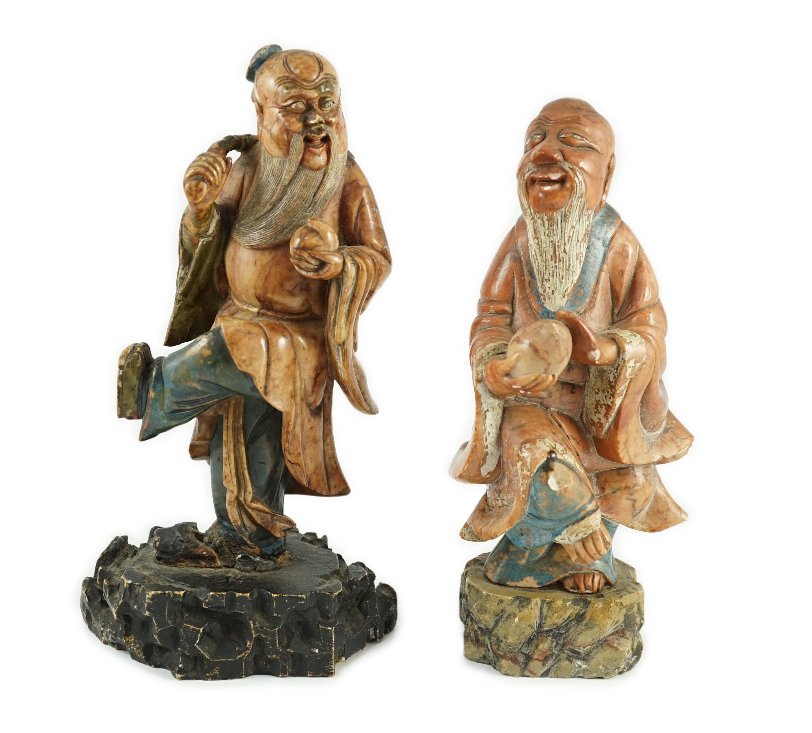 Two Chinese soapstone figures of Shou Lao, 18th century, 23cm and 24.5cm high